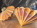 Pair of Floating Orange Ribbed Diamond ceramic baubles, pleated fan shapes with orange, copper and violet glaze.